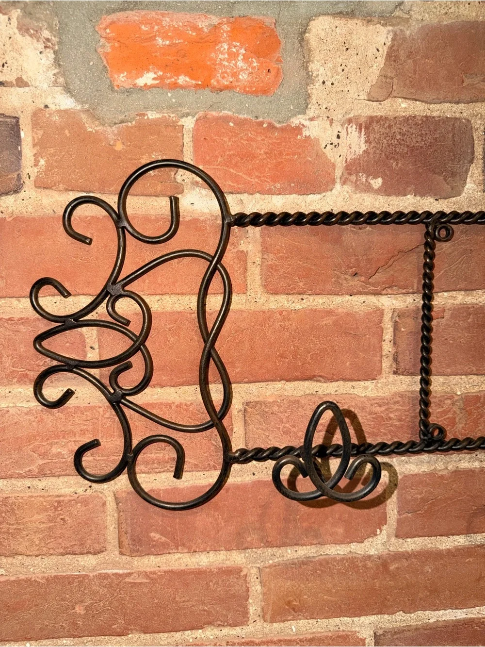 Ornate Black Metal Wall Hook Rack with Scroll Accents
